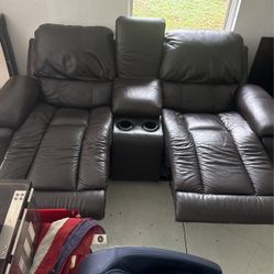 Lazy Boy Loveseat. Electric. Good Condition. Black Leather With Cup holders And Compartment 