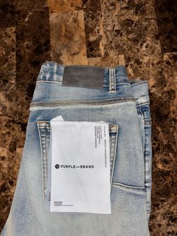 Blue and black purple brand jeans