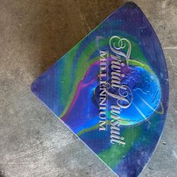 Brand new COMPLETE in Tin Box Millennium Edition Trivial Pursuit Board Game 