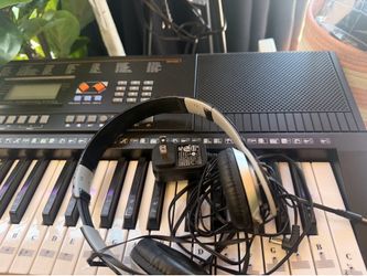 Piano kids with illuminated keys headphones, mic, chair and stand