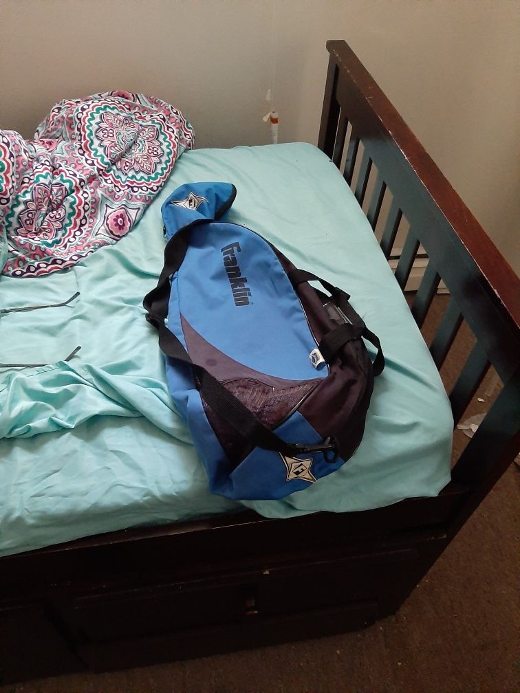 Tennis racket with ball and bag