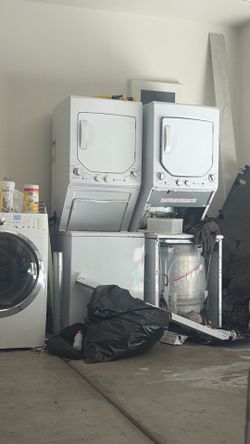 2 washers and a refrigerator