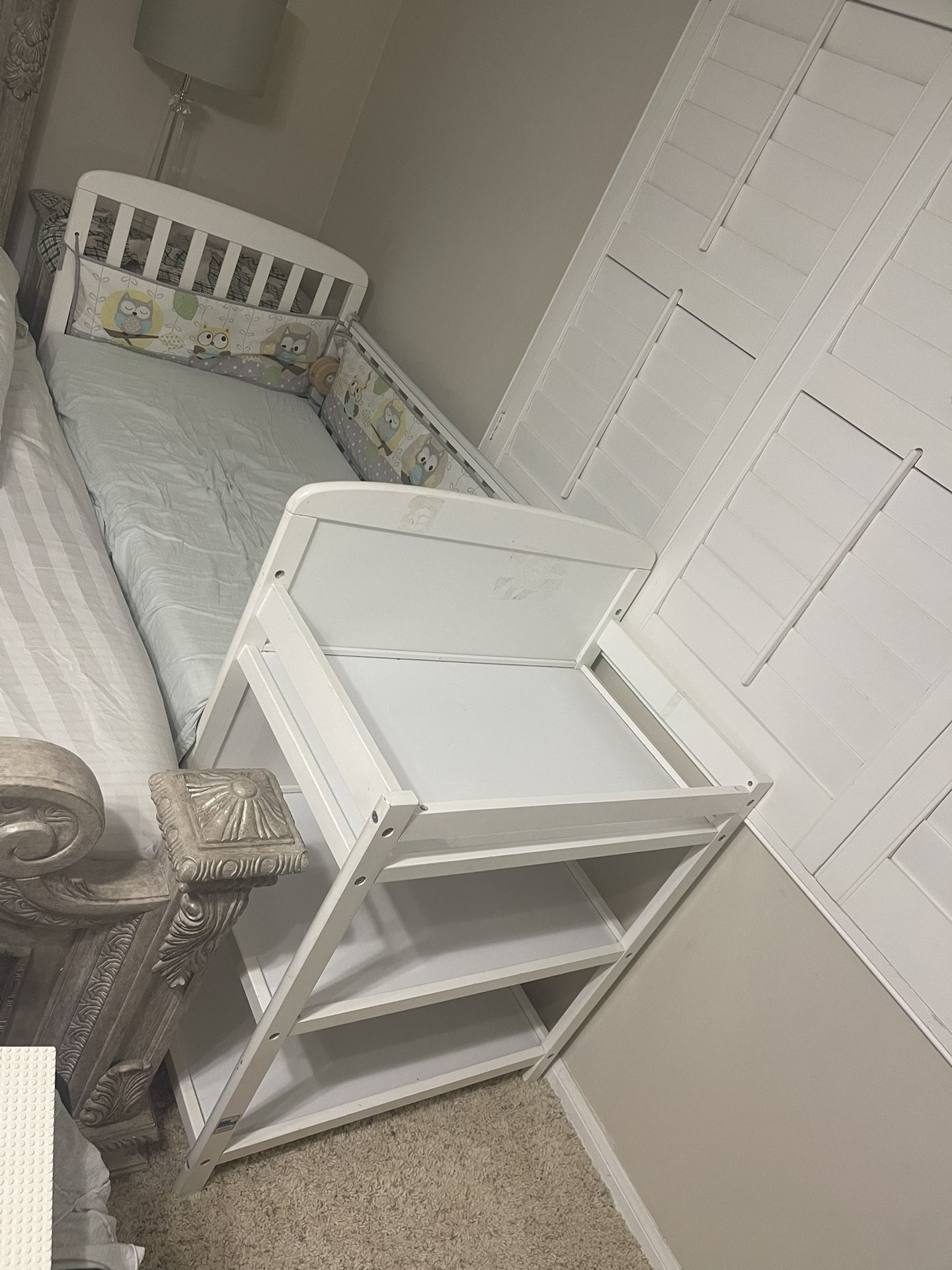 Baby bed with changing table