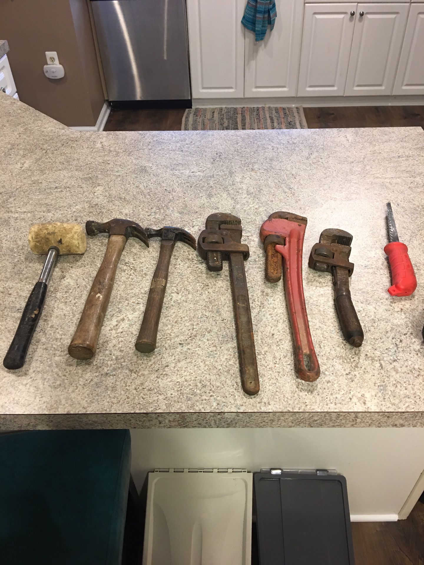 Hammer, wrenches and dry wall saw