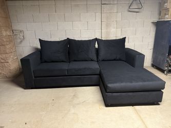 sofa with reversable chaise black velvet new in plastic