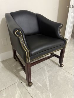 Leather chair with wheels