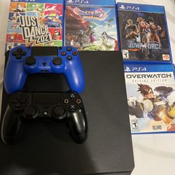 PS4 With 2 Controllers And 4 Games 