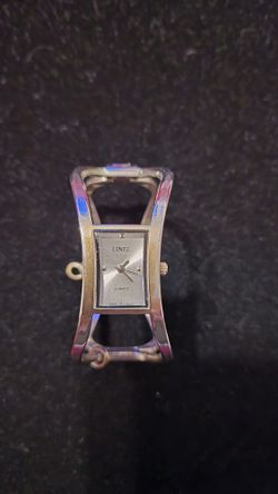 Linel Quartz women's cuff-style watch. 