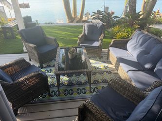 Patio sofa and chairs set