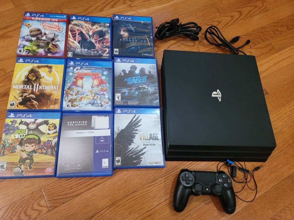 Sony PS4 PRO with 9 Games And a Controller