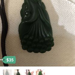 Carved jade flower pendant