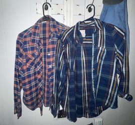 Women’s 14 piece lot of flannels/jeans/tops/Small/Mediums - Smoke  free  $12 obo 67th  ave/Bell 