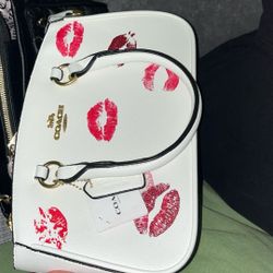 coach bag kiss 