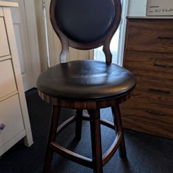 1 Dark Wood Swivel Counter Height Chair w/ Back