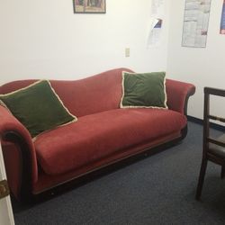 Red Couch With 2 Pillows