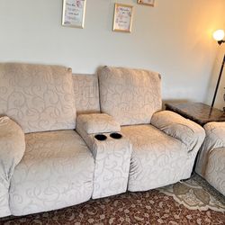 Ashley reclining 5 seater leather sofa with covers on