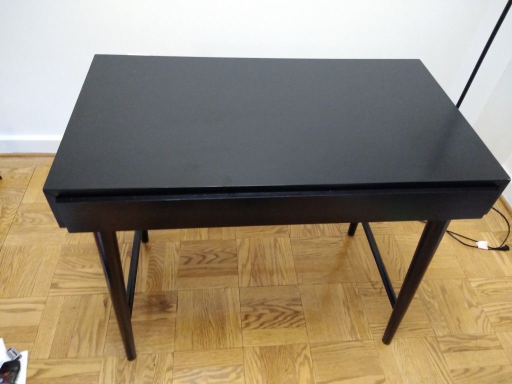 Solid black desk