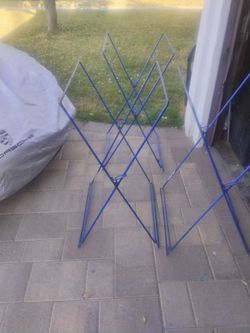 Three steel table supports 4 ft tall holds a lot of weight