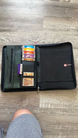 Pokémon binder with energy Pokémon cards and a free pokemon book