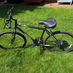 A pair of  dynacraft 15 speed mountain bikes.