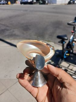 vintage mother-of-pearl shell mounted on a pedestal base