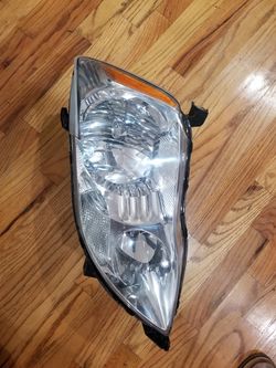 2005-2007 Toyota Avalon Headlight Left LH halogen OEM with Bulbs