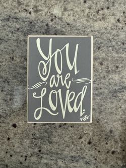 Gray Wood sign “Love are Loved”