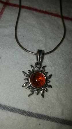 Necklace with amber sun