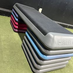 Selling aerobic step platforms with adjustable risers.