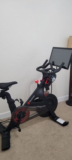 Peloton stationery bike with shoes