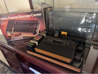 Atari 2600 w/ Games and Storage Case
