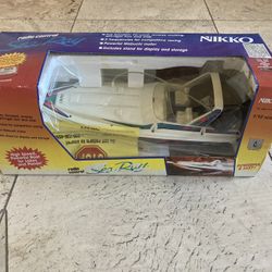 Vintage remote controlled sped boat in box Cheap for quick sale 