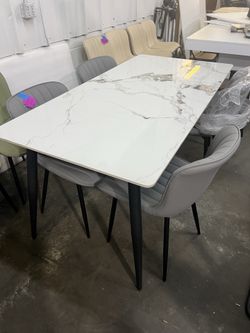 Brand new 5 pcs of set, Sintered Stone Dining Table: 63 Inch Grey Kitchen Table with Metal Legs ,with 4 chairs  $330  Warehouse Address: 2745 Boone st