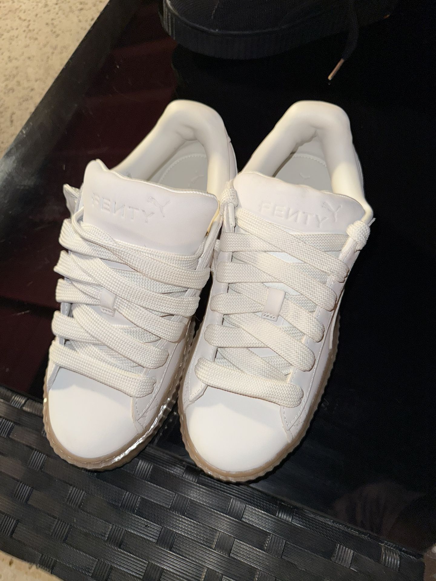 White Fenty Pumas