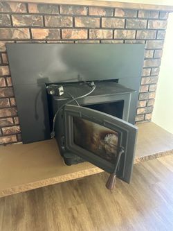 wood-burning fireplace insert with a blower