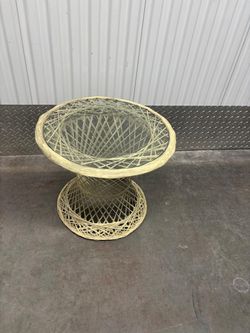 Outdoor glass top side table… 21” round ,16” high $35