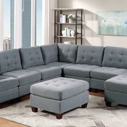 New 9 Piece Modular Sectional .  Grey Linen Fabric .  116 X 116 X 58.  Free Delivery !