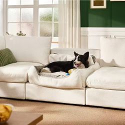The dog sofa bed is removable and washable, suitable for dogs under 45 pounds, and comes in off-white or gray.