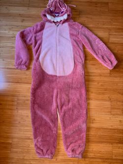 pink fleece one-piece animal kigurumi or onesie pajama.