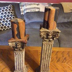 Two beautiful pedestal candleholders with candles, like new