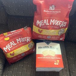 Dog canine food and bone treats Stella and Chewys freeze dried chicken and Blue Buffalo bars 