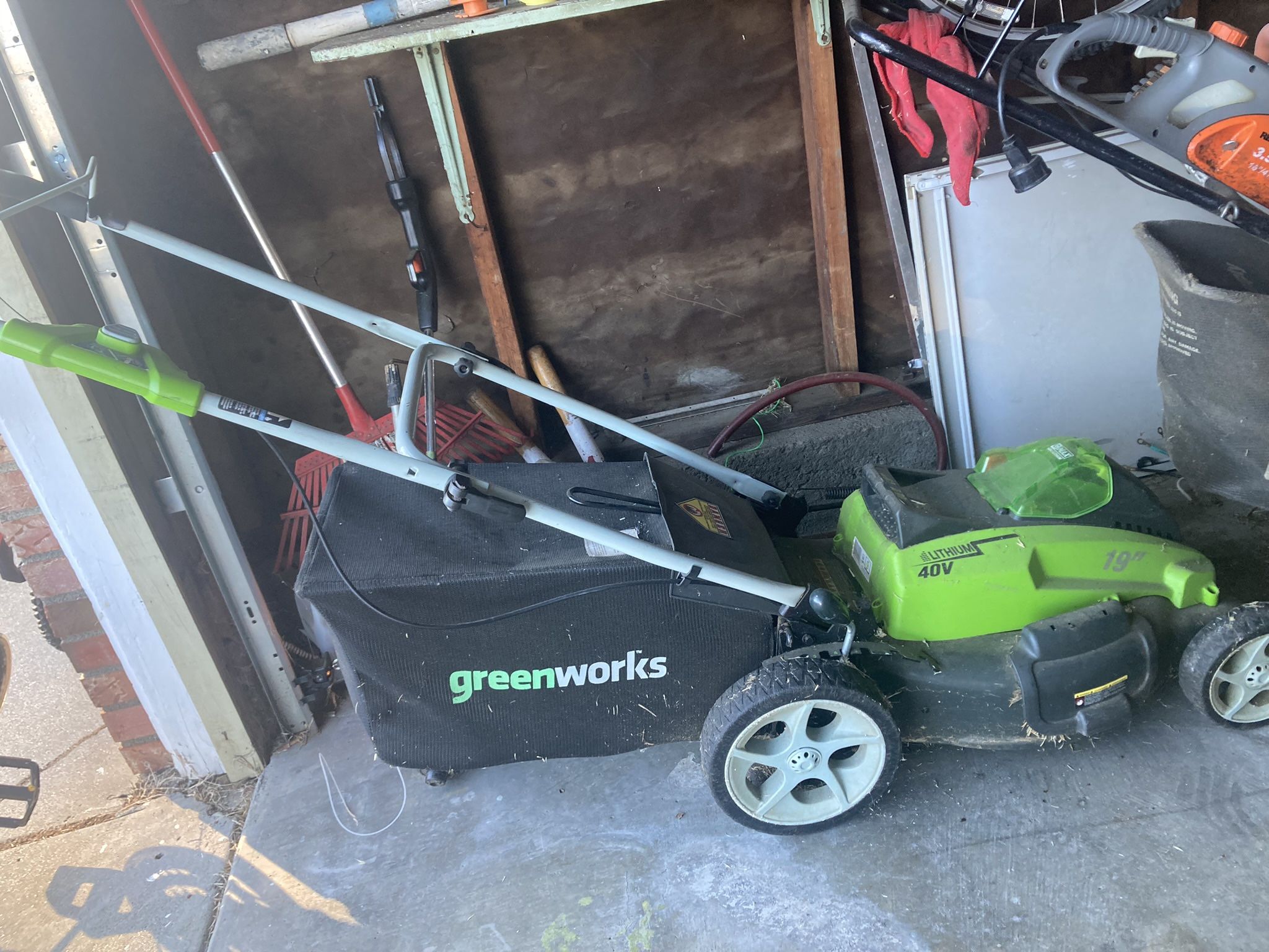 GREENWORKS Electric Lawnmower And Dethacher. Weed eater