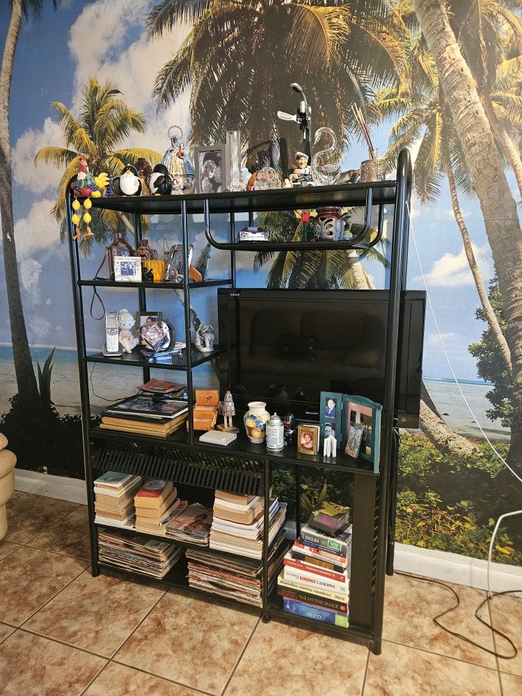 Black Entertainment Center With Shelves And CD Storage. Accommodates Up To A 28 T.V.