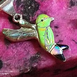 HUMMINGBIRD, *INLAY TURQUOISE/*INLAY ABALONE WINGS. *AMERICAN INDIAN MADE*. SUSPENDED ON AN 18-IN STERLING CHAIN. (NC-230994)