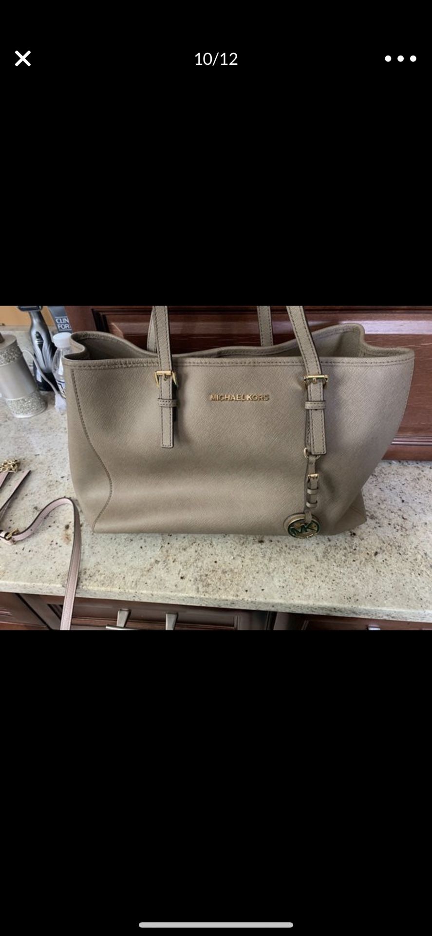 Michael Kors grey handbags.