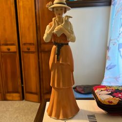 Girl Holding lamb Figurine 