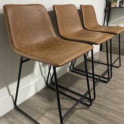 24" Caramel Bowden Faux Leather Counter Height Barstool with Footrest - Set of 3