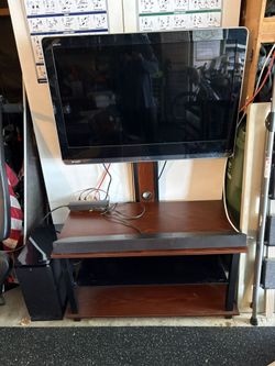 TV Stand With Surround Sound and TV