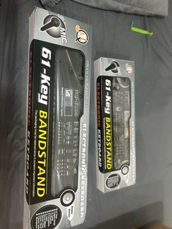 TWO BRAND NEW 61 KEY KEYBOARDS WITH MICROPHONE