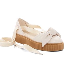 Rihanna’s puma Fenty creeper sandal tint pink